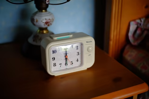 Put your alarm clock farther than hand-length